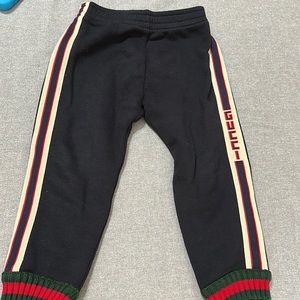 Gucci navy blue toddler jogging suit.
